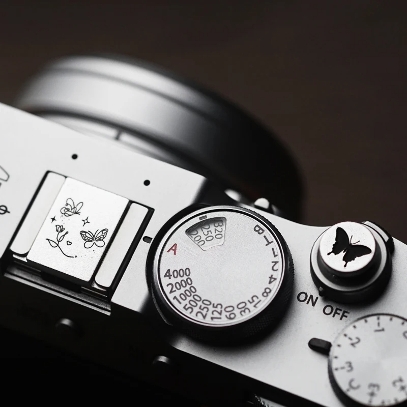 Fujifilm Camera X100Vi - Cubierta Metálica para Botón de Obturación
